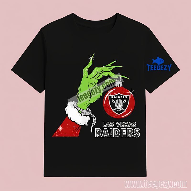 Grinch Hand Holding Las Vegas Raiders Ornament Holiday T-Shirt Grinch Hand Holding Las Vegas Raiders Ornament Holiday T-Shirt