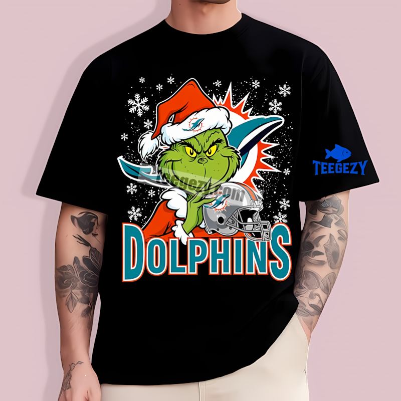 Grinch Holding Miami Dolphins Helmet Adults Shirt