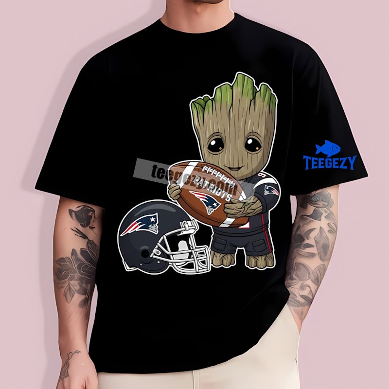 Groot Holding Football New England Patriots Dri Fit T-Shirt Groot Holding Football New England Patriots Dri Fit T-Shirt