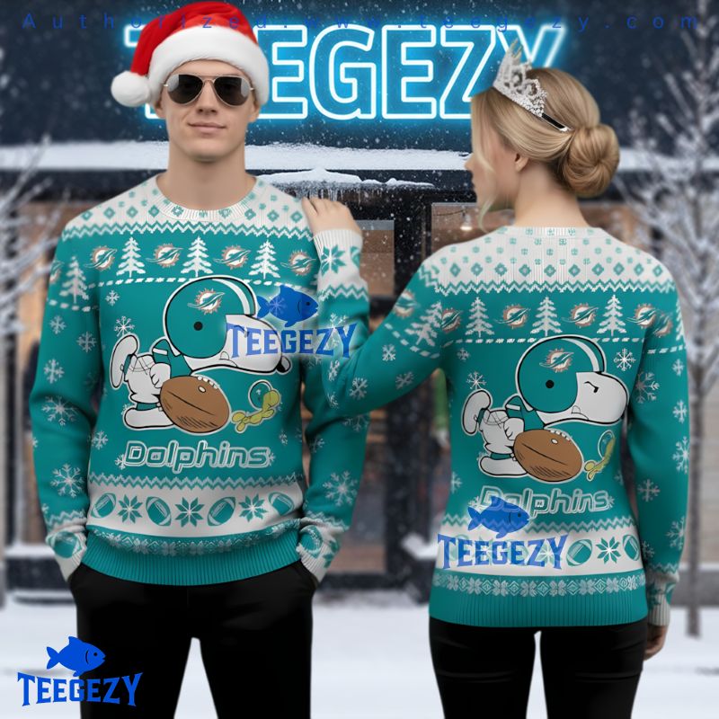 Miami Dolphins Snoopy Playing Football Ugly Christmas Sweater Miami Dolphins Snoopy Playing Football Ugly Christmas Sweater